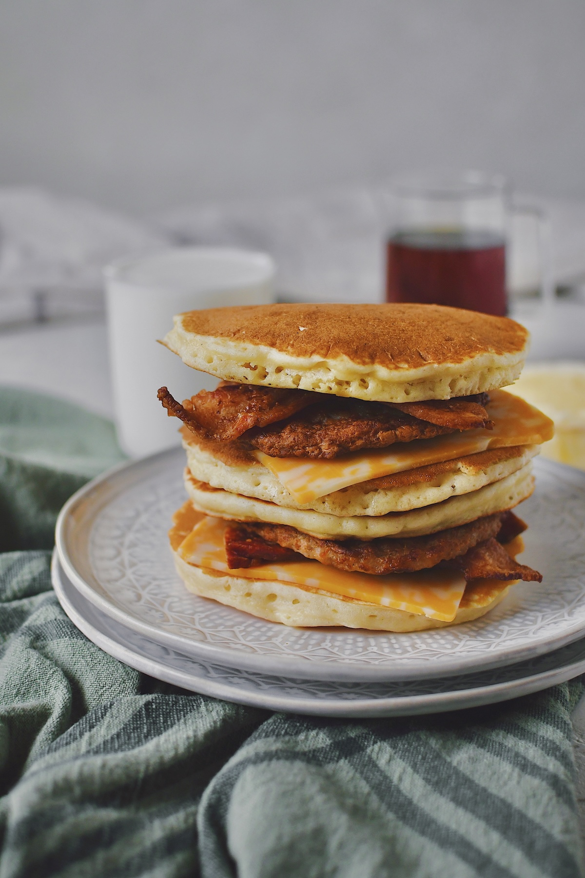 Two assembled pancake sandwiches stacked up.